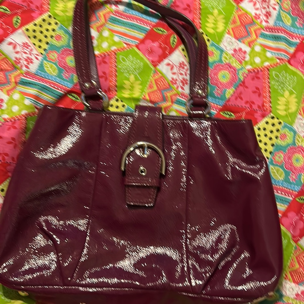 Authentic Coach patent leather handbag.
